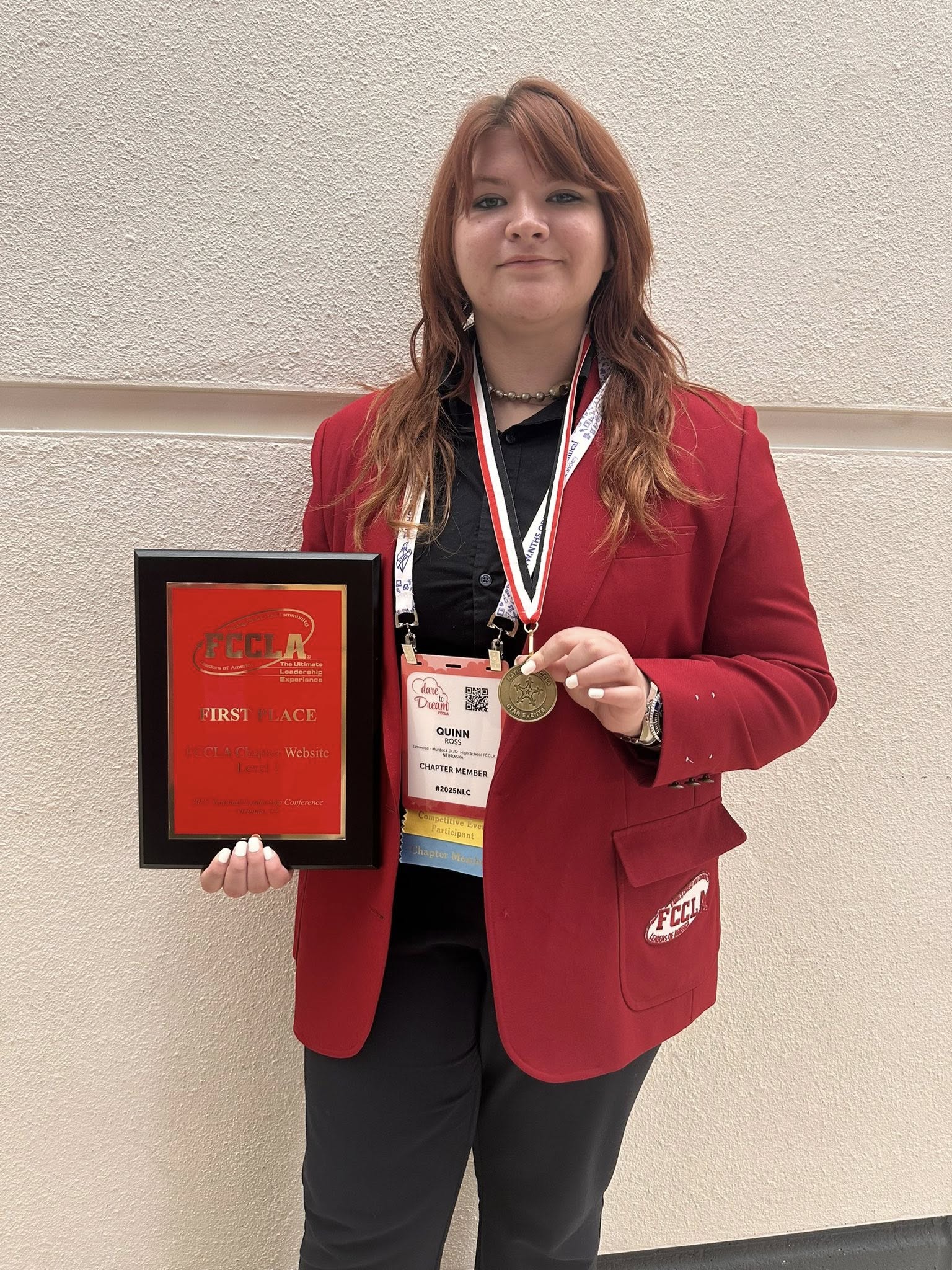 Quinn Ross with Gold Medal