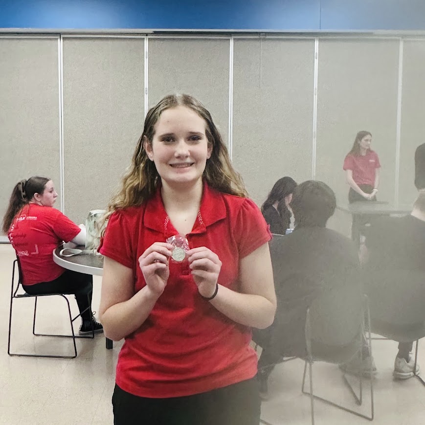 Addison Jennings with Silver Medal