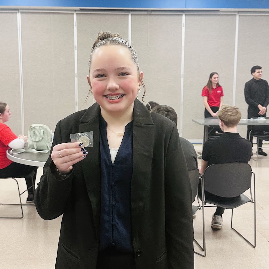 Amelia Farris with Silver Medal