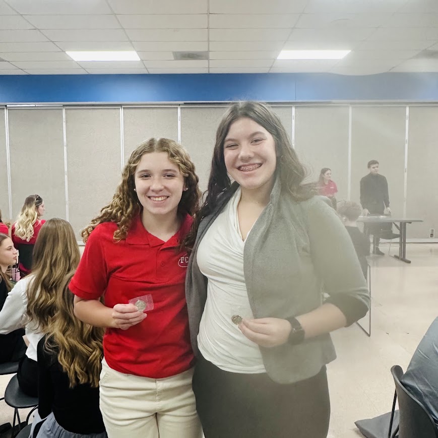 Ellie Meister and Aubrey Stewart with Silver Medals