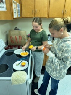 Students Frosting Cupcakes