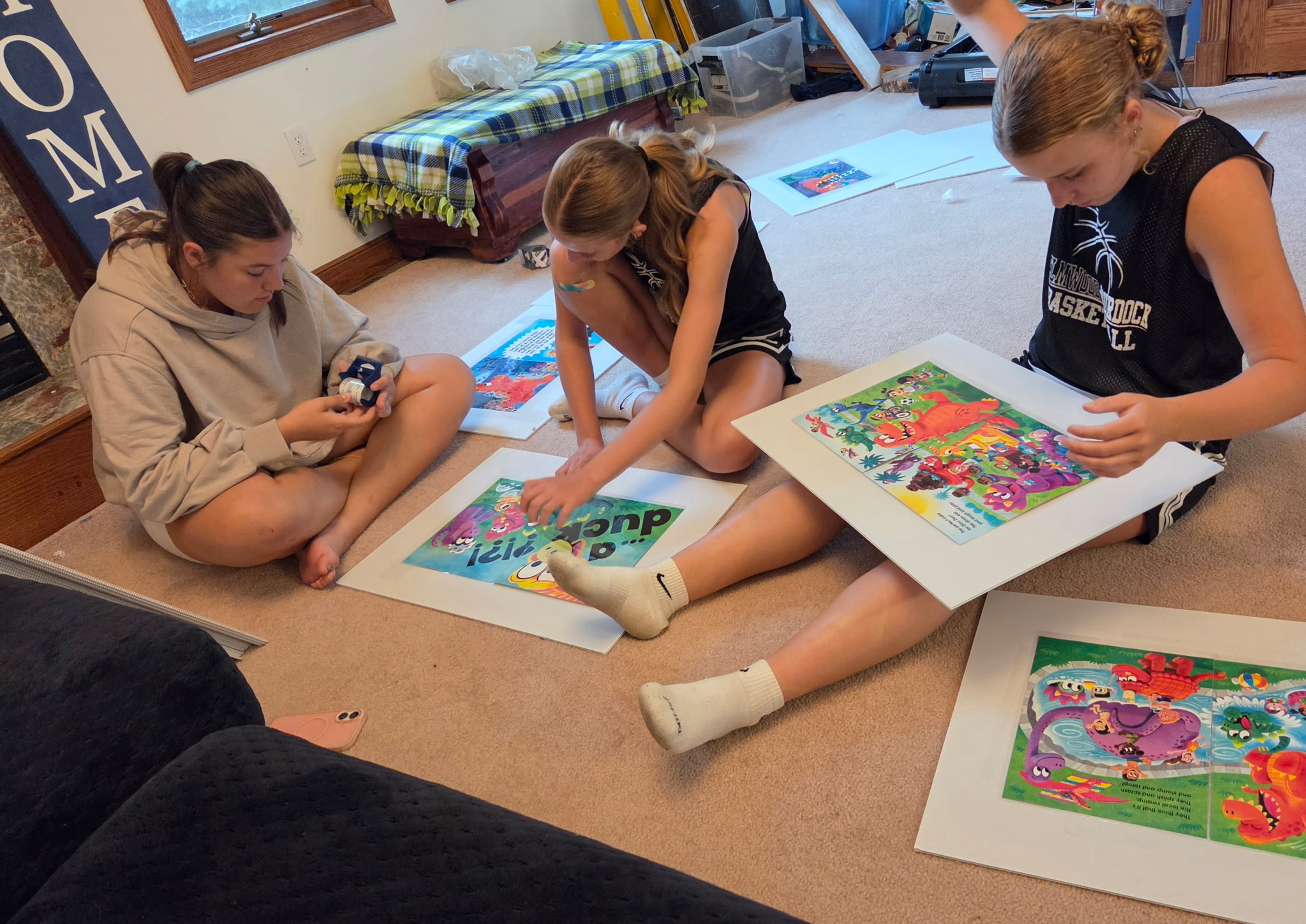 Members working on book walk signs
